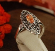 ONDA - srebrny pierścionek z topazem złocistym